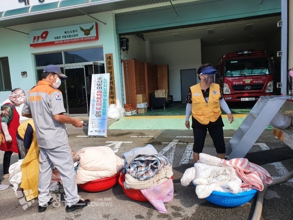예산군보건소가 진행하는 민·관이 함께하는 추석맞이 세탁봉사의 날 모습