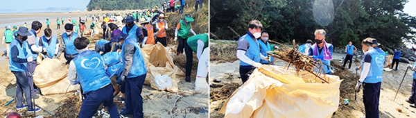 그린누리봉사단 임직원이 수해피해 지역의 환경정화 활동을 하고 있다.