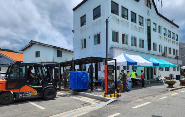 공주시전문건설협회, 옥룡동 성금 기탁 및 중장비 지원