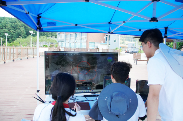 25일 중리포구 일원에서 열린 드론 배송 서비스 시연회 모습