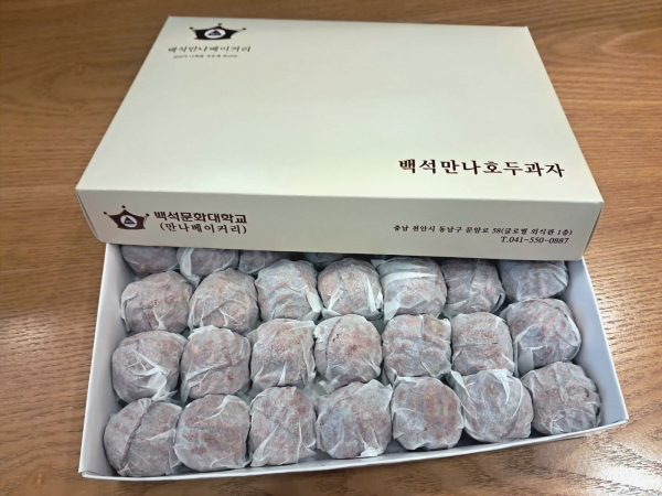 백석문화대에서 개발한 홍국쌀로 만든 ‘백석만나호두과자’ 제품 사진