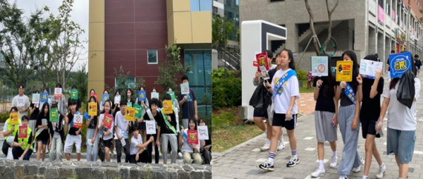 16일 산울중에서 학교 금연 절대구역 50m 확대 캠페인을 진행하고 있다.
